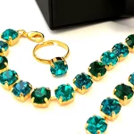 Adjustable ring with crystal “A forest of wonders” emerald color